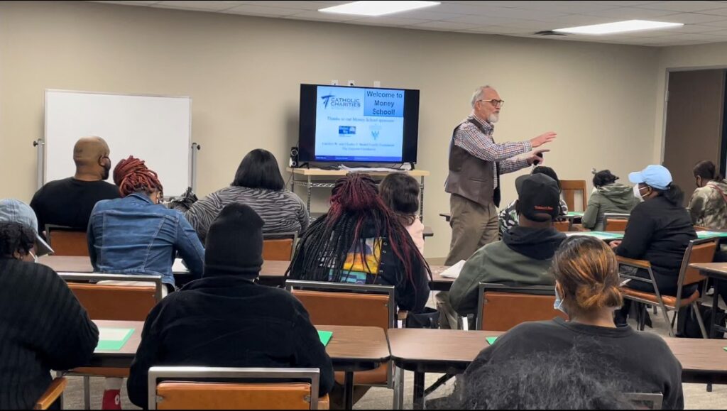 carl piehl talks to a money school class in the ccnla shreveport office